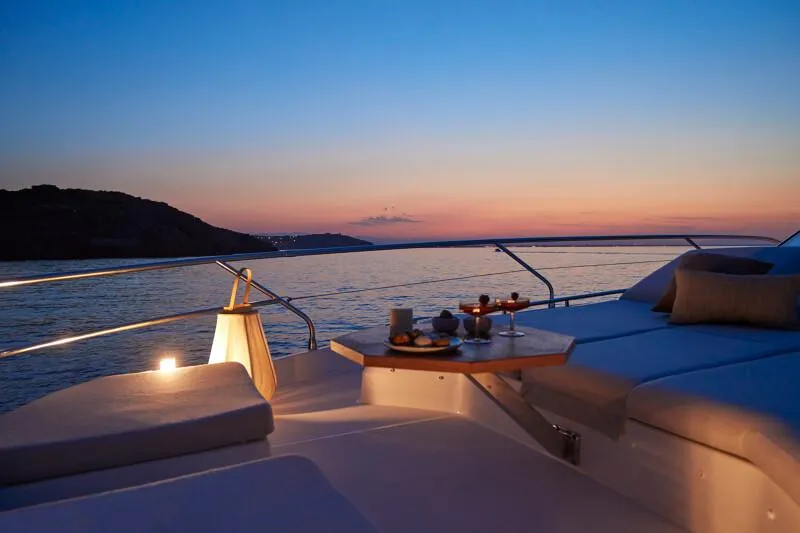 Slide: The Image of 2026 Prestige F5.7 yacht cruising on calm waters, showcasing sleek design and luxury features. - 10