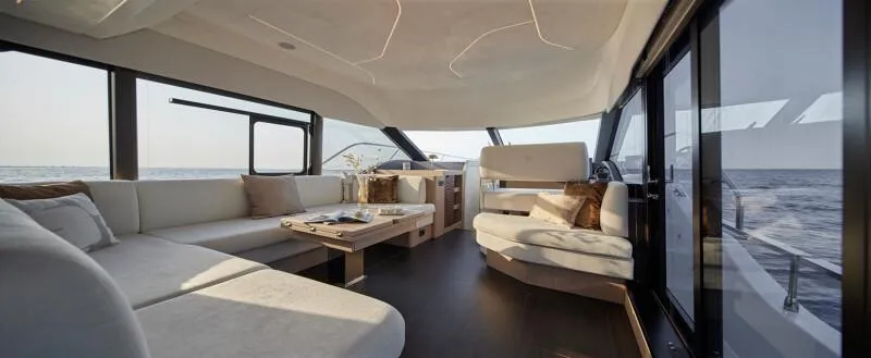 Slide: The Image of 2026 Prestige F5.7 yacht cruising on calm waters, showcasing sleek design and modern features. - 15