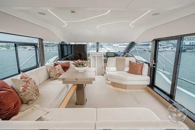 Slide: The Image of Luxurious interior of 2026 Prestige F5.7 yacht with elegant seating and panoramic windows. - 37