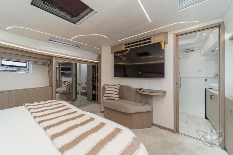 Slide: The Image of Luxurious interior of 2026 Prestige F5.7 yacht with modern bedroom and ensuite bathroom. - 43