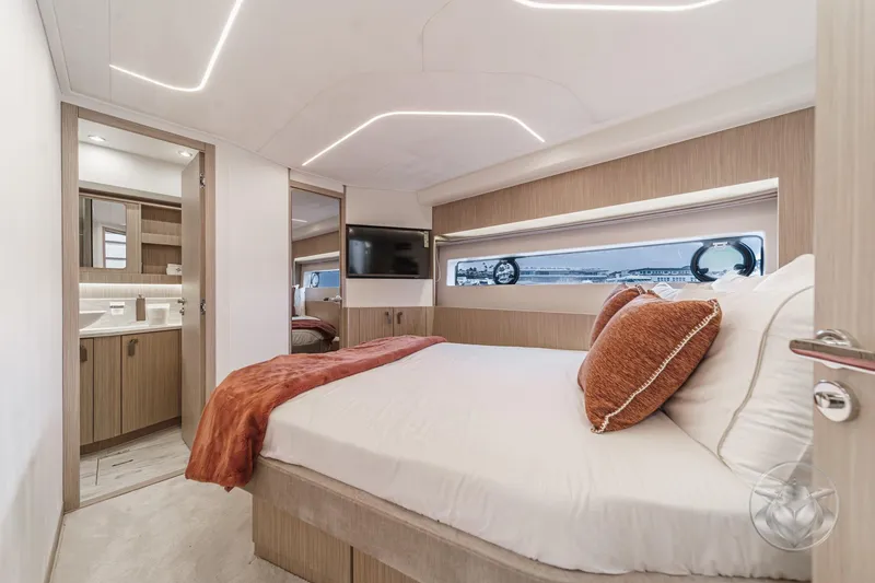Slide: The Image of Luxurious bedroom interior of 2026 Prestige F5.7 yacht with modern design and cozy bedding. - 46