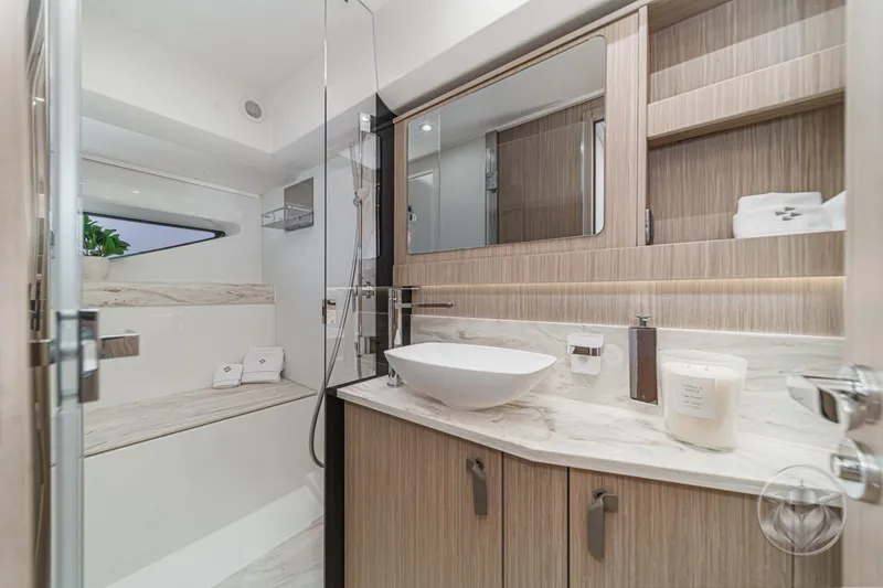Slide: The Image of Luxurious bathroom in 2026 Prestige F5.7 yacht with modern fixtures and elegant design. - 48