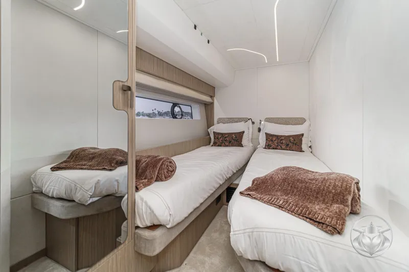 Slide: The Image of Luxurious twin cabin interior of 2026 Prestige F5.7 yacht with modern design. - 49