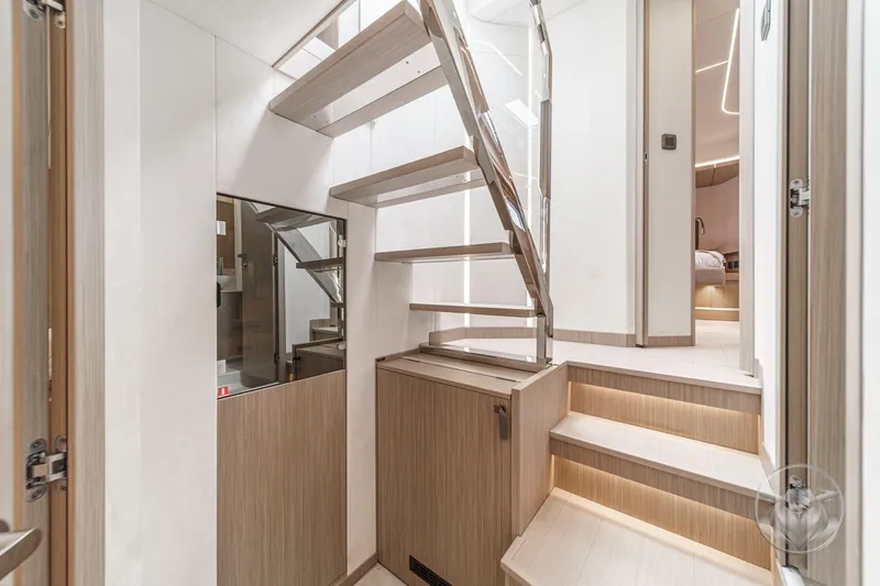 Slide: The Image of Modern interior of 2026 Prestige F5.7 yacht with sleek staircase and elegant design. - 51