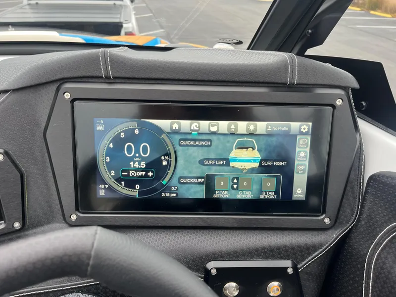 Slide: The Image of 2025 Centurion Fe22 dashboard display with navigation and surf settings. - 6