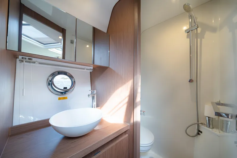 Slide: The Image of Luxurious bathroom in 2017 Beneteau Gran Turismo 40 yacht with modern fixtures. - 11