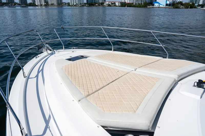 Slide: The Image of 2017 Beneteau Gran Turismo 40 yacht with sunbathing deck on calm water. - 13