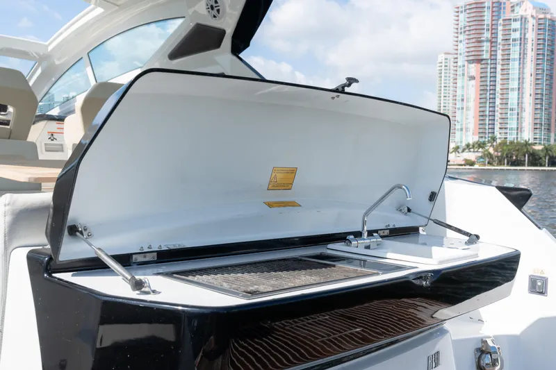 Slide: The Image of Beneteau Gran Turismo 40 yacht outdoor grill, 2017 model, with cityscape background. - 17