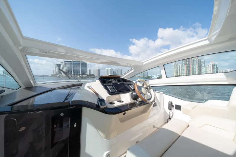 Slide: The Image of Interior view of 2017 Beneteau Gran Turismo 40 yacht with city skyline backdrop. - 6