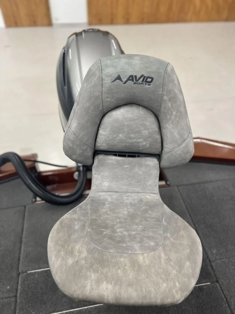 Slide: The Image of Avid 18XB 2023 boat seat with logo, gray upholstery, and sleek design. - 34