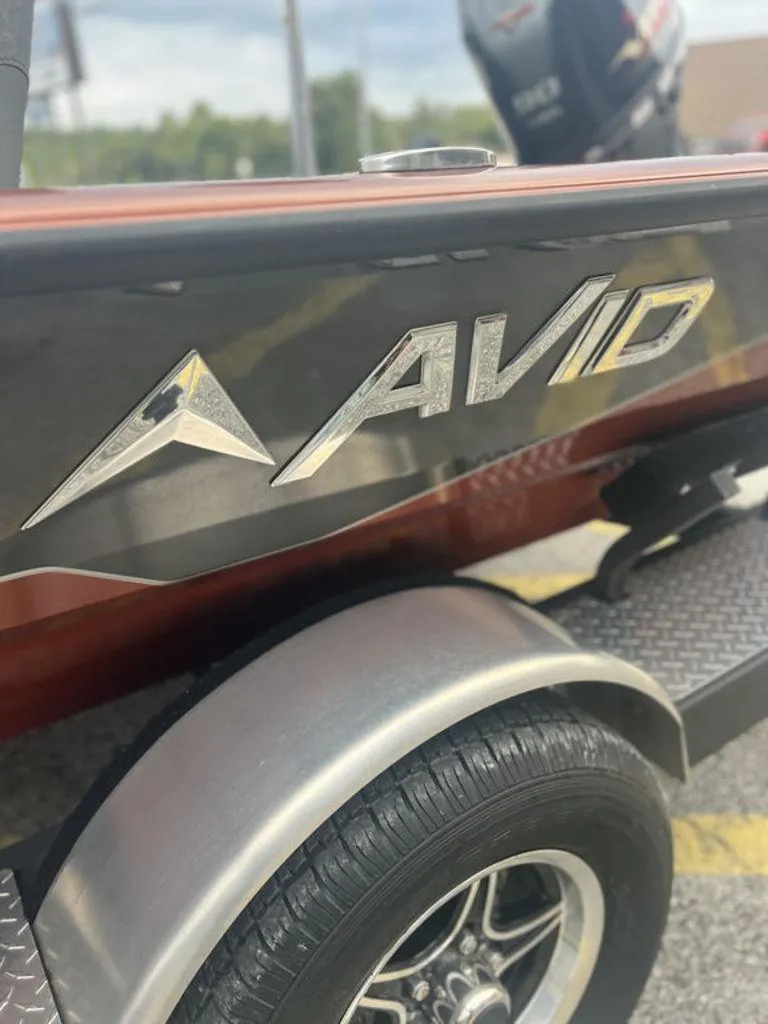 Slide: The Image of Close-up of 2023 Avid 18XB boat logo on trailer. - 39