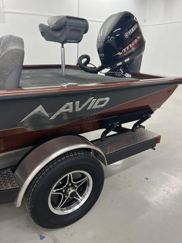 Slide: The Image of 2023 Avid 18XB boat with Yamaha VMAX engine on trailer. - 6