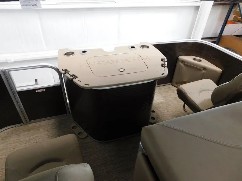 Slide: The Image of 2023 Bennington 20SSSP boat interior with seating and console. - 13