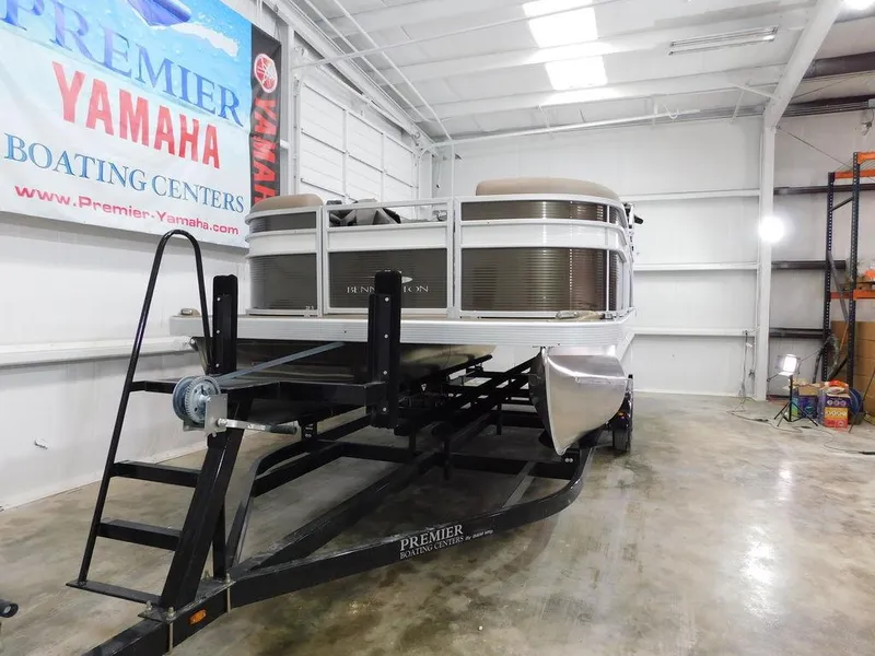 Slide: The Image of 2023 Bennington 20SSSP pontoon boat on trailer in showroom. - 7