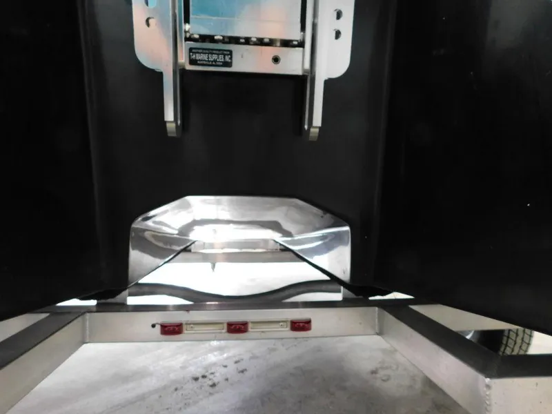 Slide: The Image of 2024 Freedom 14 CHIQUITA trailer hitch and rear view, featuring durable construction. - 10