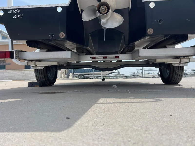 Slide: The Image of Underneath view of a 2024 Freedom 14 CHIQUITA boat on a trailer. - 22
