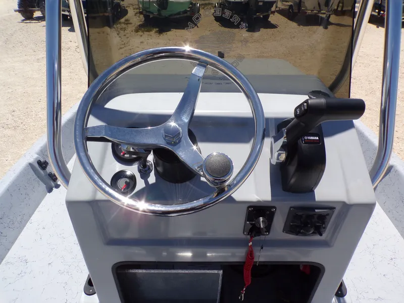 Slide: The Image of Steering console of Freedom Eagle 16 boat, model year 2025. - 27