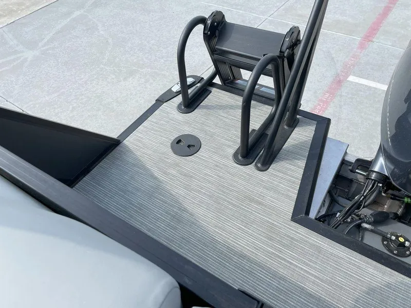 Slide: The Image of 2024 Viaggio V22U boat deck with motor and railing, featuring modern design. - 17