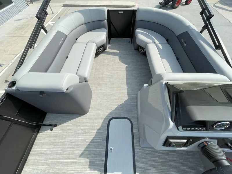 Slide: The Image of 2024 Viaggio V22U boat interior with gray seating and modern dashboard. - 18