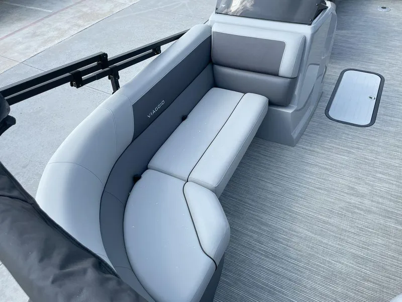 Slide: The Image of 2024 Viaggio V22U boat interior with gray seating and modern design. - 9