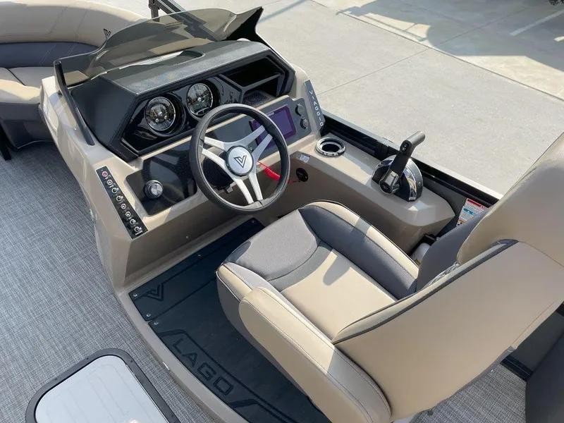 Slide: The Image of 2024 Viaggio Z22S boat cockpit with steering wheel and control panel. - 11