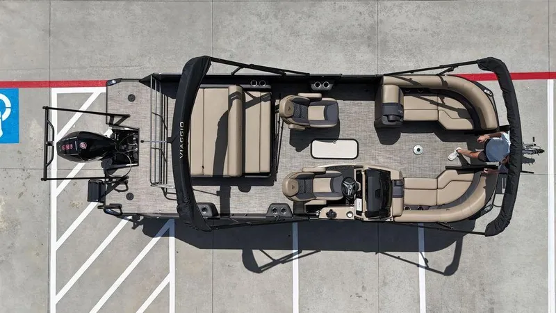 Slide: The Image of Aerial view of 2024 Viaggio Z22S pontoon boat parked on concrete. - 27