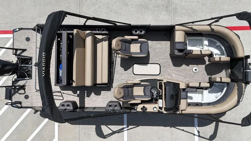 Slide: The Image of Aerial view of 2024 Viaggio Z22S pontoon boat with beige seating and black canopy. - 28
