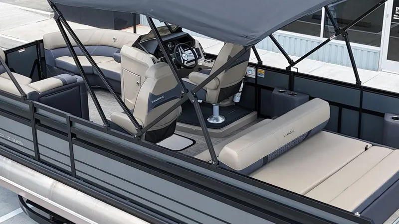 Slide: The Image of 2024 Viaggio Z22S pontoon boat with spacious seating and modern design. - 30