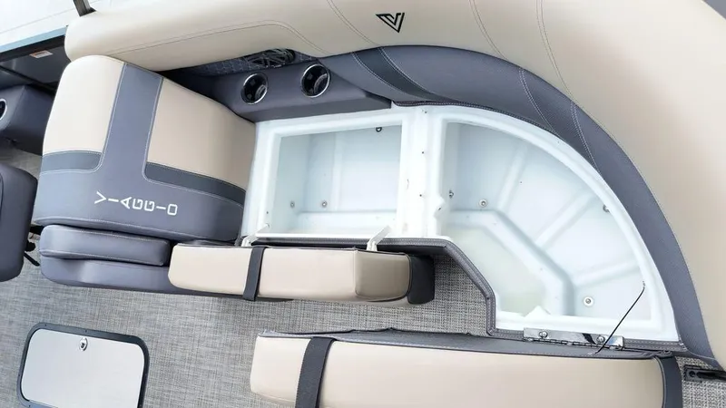 Slide: The Image of 2024 Viaggio Z22S boat interior with open storage compartment and cushioned seating. - 36