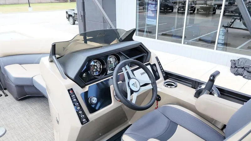 Slide: The Image of 2024 Viaggio Z22S boat dashboard with steering wheel and controls. - 37