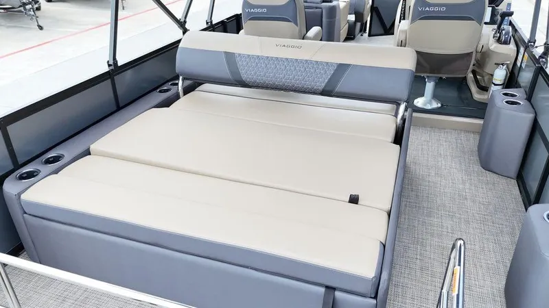Slide: The Image of 2024 Viaggio Z22S boat interior with convertible seating and cup holders. - 41