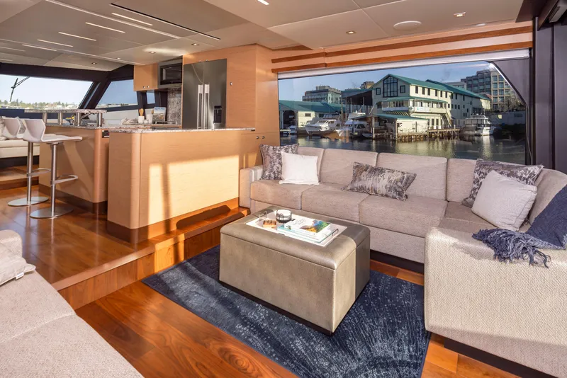 Slide: The Image of Luxurious interior of 2020 Ocean Alexander 70E Motoryacht with modern furnishings and waterfront view. - 13