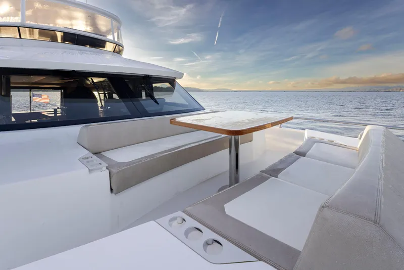 Slide: The Image of Luxurious 2020 Ocean Alexander 70E Motoryacht deck with seating and ocean view. - 25