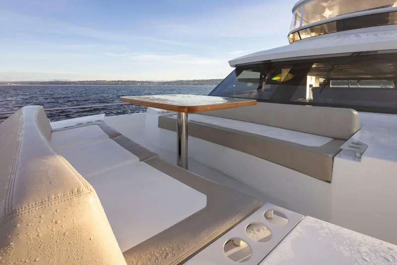 Slide: The Image of Ocean Alexander 70E Motoryacht 2020, luxurious deck seating with ocean view. - 26