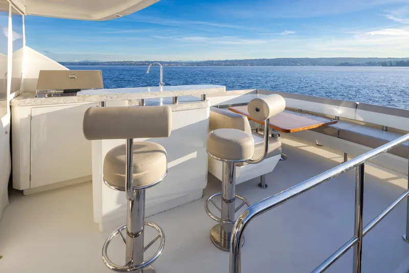 Slide: The Image of Luxurious 2020 Ocean Alexander 70E Motoryacht deck with seating and ocean view. - 33
