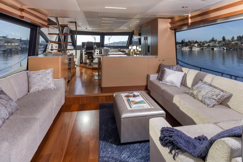 Slide: The Image of Luxurious interior of 2020 Ocean Alexander 70E Motoryacht with elegant seating and scenic views. - 41