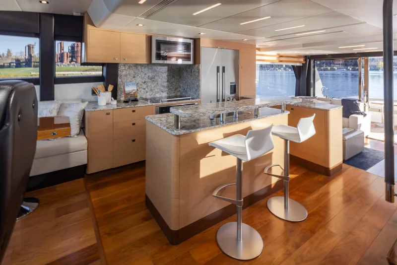 Slide: The Image of Luxurious kitchen interior of 2020 Ocean Alexander 70E Motoryacht with modern design and waterfront view. - 44