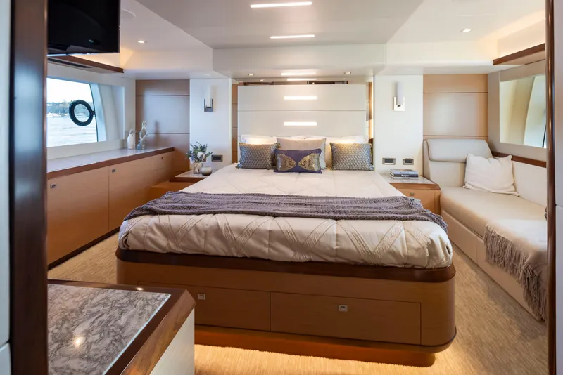 Slide: The Image of Luxurious bedroom interior of 2020 Ocean Alexander 70E Motoryacht with modern design and cozy ambiance. - 47