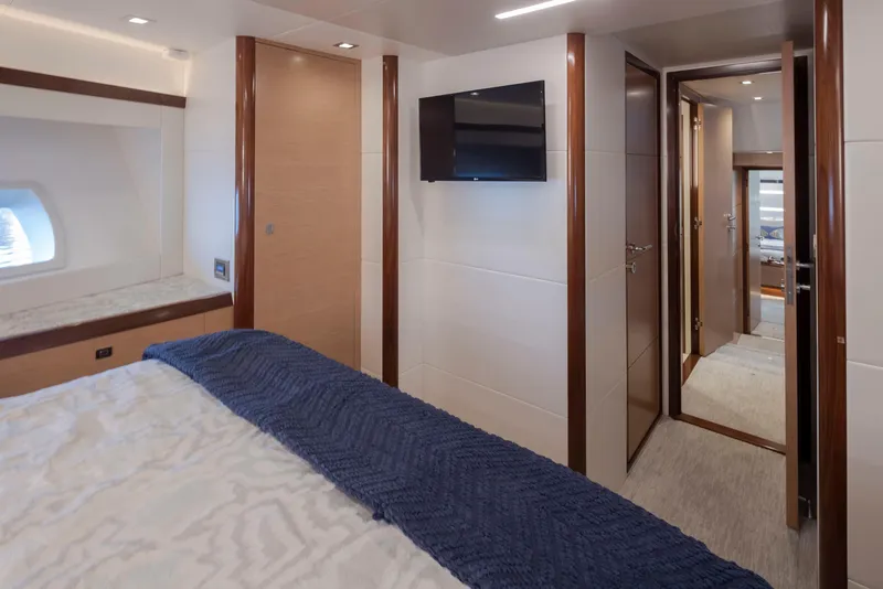 Slide: The Image of Luxurious bedroom interior of 2020 Ocean Alexander 70E Motoryacht with modern decor. - 48