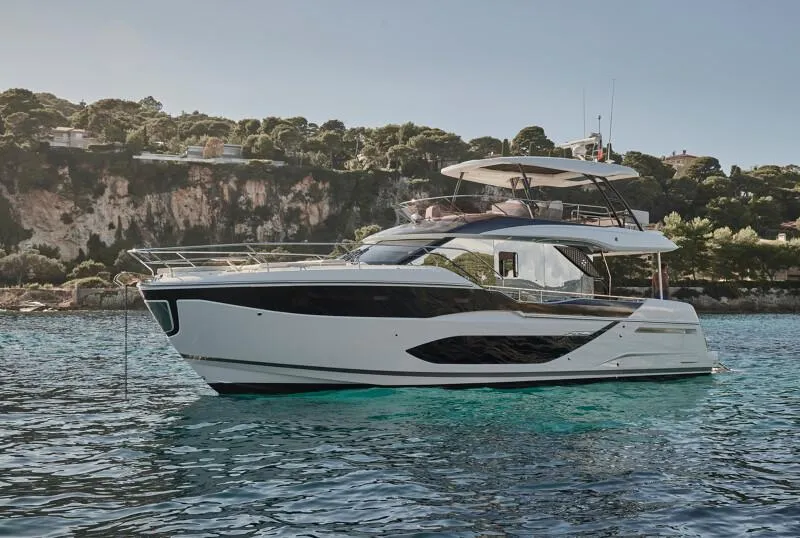 The Image of Luxury Prestige F5.7 yacht cruising in scenic coastal waters, 2026 model. - 0