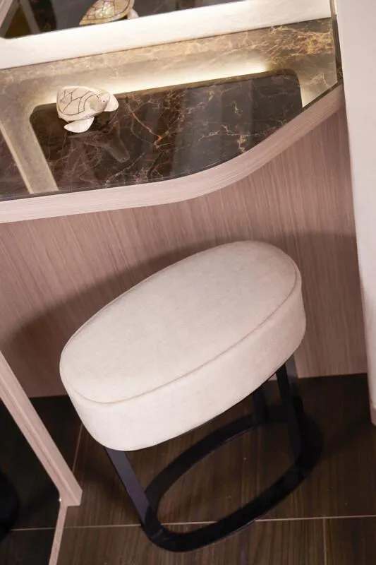 Slide: The Image of Elegant Prestige F5.7 2026 interior with marble countertop and cushioned stool. - 26