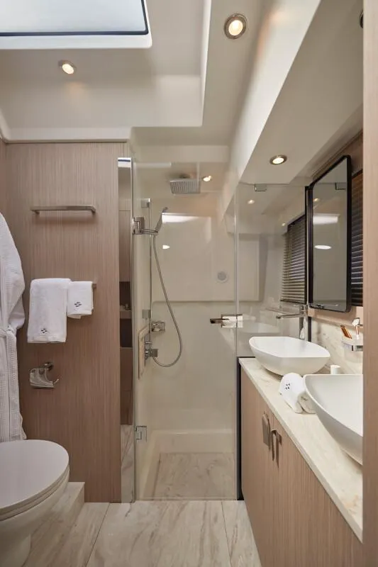 Slide: The Image of Luxurious bathroom in 2026 Prestige F5.7 yacht with modern fixtures and elegant design. - 28