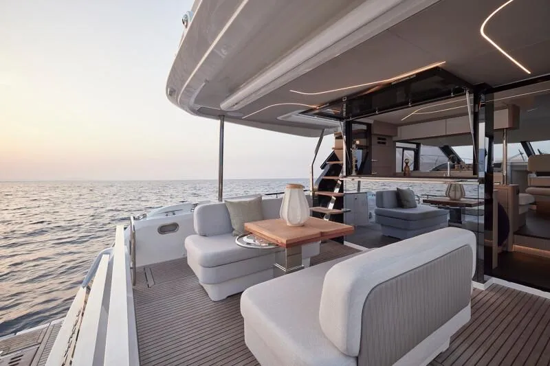 Slide: The Image of Luxurious Prestige F5.7 yacht deck with elegant seating, ocean view, 2026 model. - 9