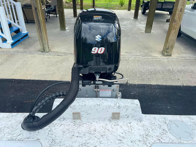 Slide: The Image of 2013 Dream Boats C-18 with Suzuki 90 outboard motor. - 12