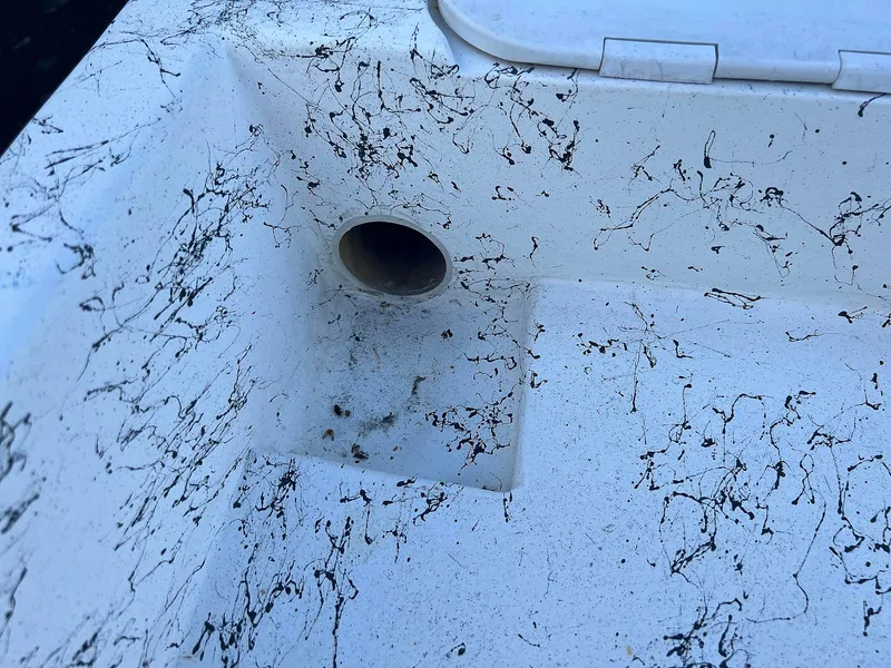 Slide: The Image of Close-up of Dream Boats C-18, 2013 model, featuring a textured white surface with drain hole. - 17