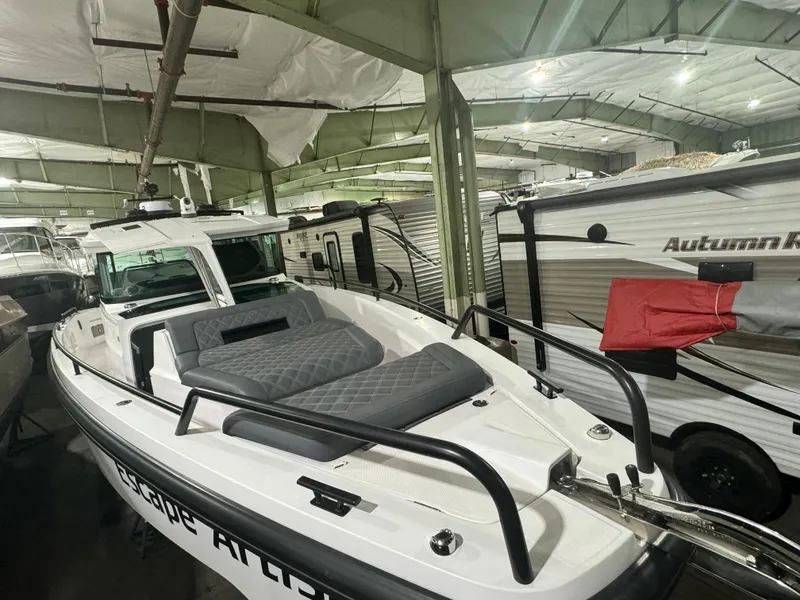 Slide: The Image of 2020 Axopar 37 Cross Cabin BRABUS boat deck detail with cleat and railing. - 17