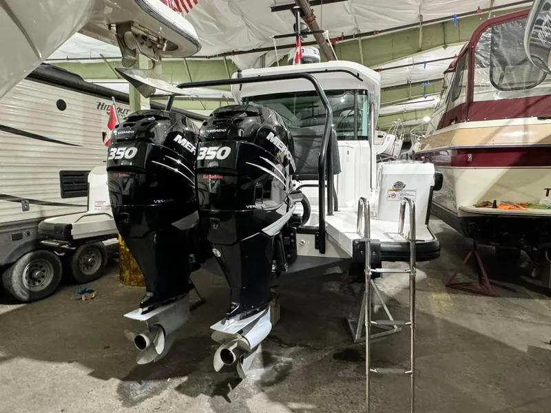Slide: The Image of Twin Mercury Verado 350 engines on a 2020 Axopar 37 Cross Cabin BRABUS boat. - 22