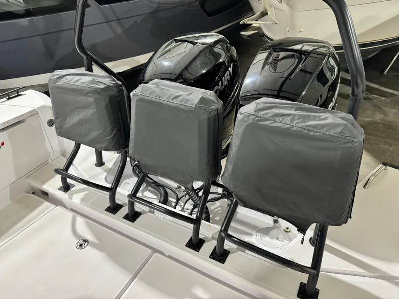 Slide: The Image of 2020 Axopar 37 Cross Cabin BRABUS boat interior with white storage compartment. - 32