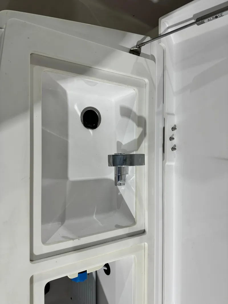 Slide: The Image of 2020 Axopar 37 Cross Cabin BRABUS interior storage compartments. - 34