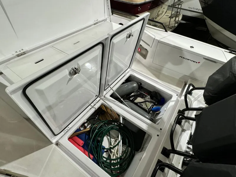 Slide: The Image of Control panel of 2020 Axopar 37 Cross Cabin BRABUS with dual screens and buttons. - 41